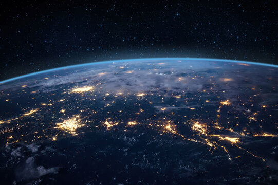 Atmosphere of the Earth from space view of planet Earth. City lights. Elements of this image were furnished by NASA.