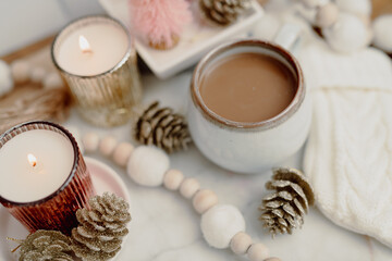 Cozy Winter Styled Coffee with Pink and Gold Accents 