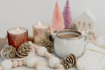 Fototapeta na wymiar Cozy Winter Styled Coffee with Pink and Gold Accents 