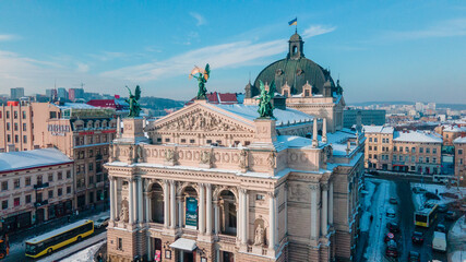 aerial view of city square in front of opera building in Lviv, sunny winter day - obrazy, fototapety, plakaty