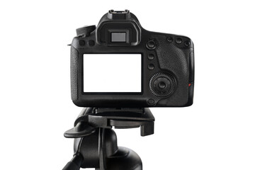 Close-up of digital professional camera with blank screen standing on tripod isolated on white...