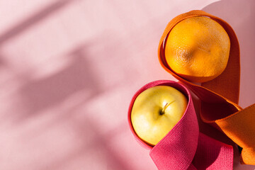 Fitness elastic rubber band with fruits. Diet healthy food and lifestyle health concept.