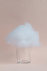 simulated cloud on empty glass, creative concept