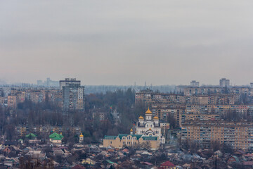 City in the evening. Top view of the Orthodox church. Urban landscape. Kryvyi Rih, Ukraine.