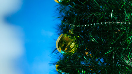 detail of christmas decorations with tree and wall