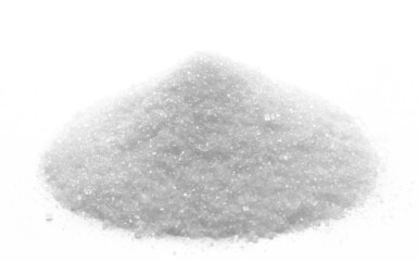 Sugar crystal pile (sugar beet) isolated on white