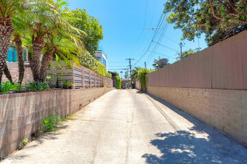 Concrete path in the middle of a residential area at La Jolla, California