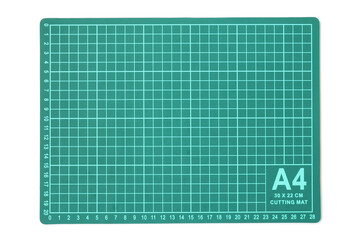 Mat for cutting paper, cardboard and fabric isolated on white