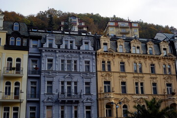 Fototapeta na wymiar Czech Republic, Karlovy Vary. Ancient architecture of one of the most beautiful cities in the world (hotels, shops) along the Tepla River. ASTORIA Hotel & Medical Spa