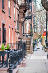 Fototapeta na wymiar Street and buildings of West Village in Manhattan, New York City