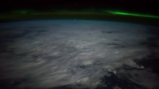 Aurora Borealis Over Canada.
The International Space Station.
Source material was provided by NASA.
Color correction was done, noise was removed and slowed down.