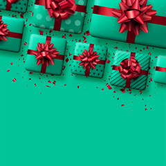 Green gift boxes with red bows and confetti.
