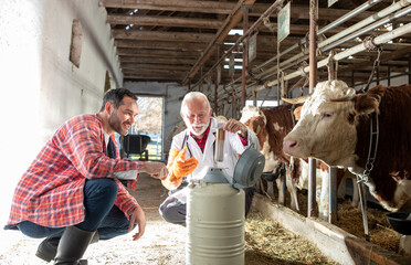 Veterinarian holding semen for cows artificial insemination