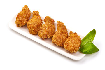 Fried chicken strips in breadcrumbs, isolated on white background.