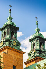 Fototapeta premium Gniezno, Poland - August 09, 2021. The Primatial Cathedral Basilica of the Assumption of the Blessed Virgin Mary and Shrine of St. Adalbert - details of exterior