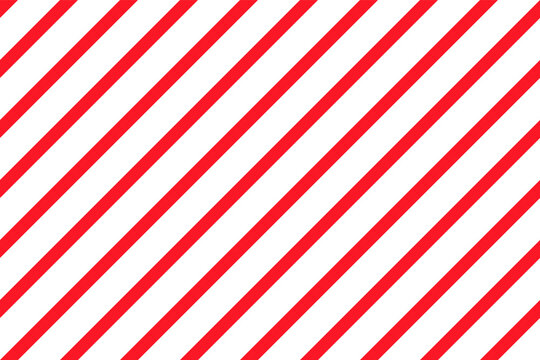 Candy cane seamless pattern. Christmas striped red background. Xmas prints with diagonal lines. Abstract geometric texture. Cute holiday wrapping paper. Vector illustration.
