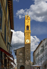Montalcino, Tuscany, Italy. August 2020. The clock tower in piazza del popolo, the main one in the historic center.