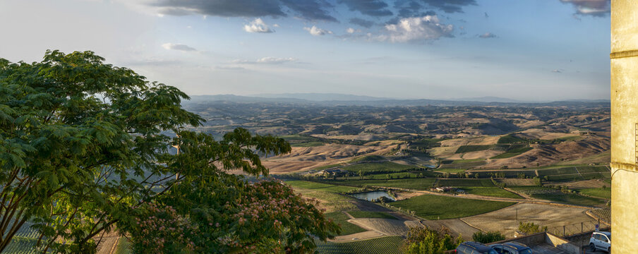 Montalcino, Tuscany, Italy. August 2020. Amazing large format panoramic photo from the historic center of the village towards the landscape of the Tuscan countryside.