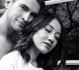 Fototapeta premium young pretty couple together in bed sleeping chill, lifestyle people concept, black and white