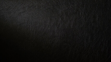 Macro shot of detailed black leather background. Dark textured close-up on quality leather parchment. Can be used in the background for luxury products and designs.