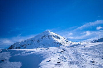 富山県立山町にある立山の冬の雪景色のある風景 Landscape with snowy winter scenery of Tateyama in Tateyama Town, Toyama Prefecture, Japan.