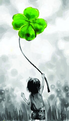 beautiful child with four leaf clover, St. Patrick's Day
