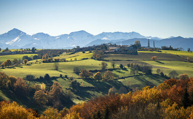 Landscape of southwestern France in autumn with the Pyrenees mountains in the background 