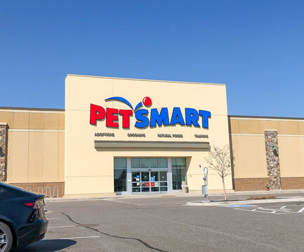 BAXTER, MN - 1 SEP 2021: PetSmart retail store entrance on a sunny day from parking lot. PetSmart is a privately held American chain of pet superstores, selling pet products, services, and small pets