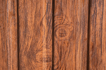 Obraz premium Glossy textured brown wooden planks, macro photo