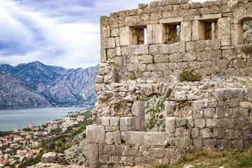 View of the ruins of the fortress and the old town of Kotor. Montenegro, Balkans. Bay of Kotor. The mountains.