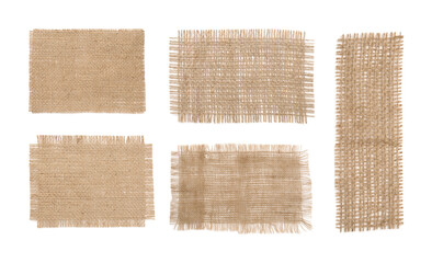 Set with pieces of natural burlap fabric on white background, top view