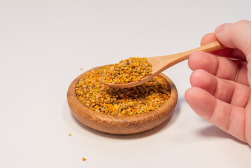 A man eats bee pollen.