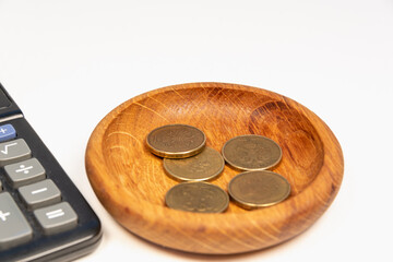 Calculator and small money. Poverty, bankruptcy, counting the balances of the household budget.