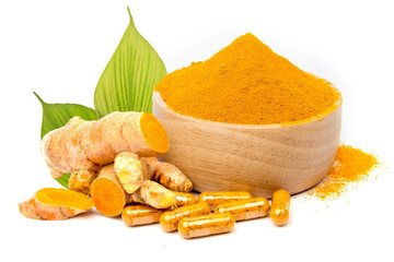 Fresh turmeric and turmeric powder in capsules, Thai herbs. isolated on white background.
