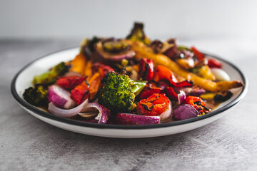 vegan roast with mixed fresh vegetables freshly picked from the garden, healthy plant-based food and locally grown