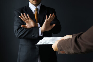 Corruption and Bribery,Businessman manager refusing receive money dollar bills to deal contract