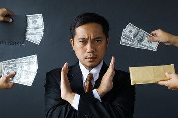 Anti bribery and corruption concept, Business man refusing and don't receive money banknote in...