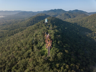 Aerial view of Wat Phra That Doi Phra Chan temple located on the serene top hill in Mae Tha...