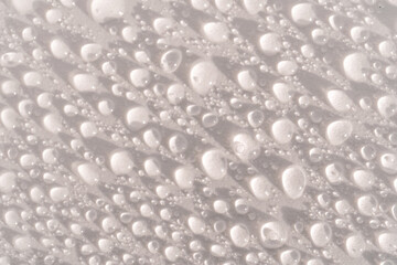 Lots of drops on a white background.
