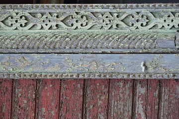 Old carved grunge stained wooden background 