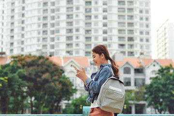 Woman use of mobile phone in city