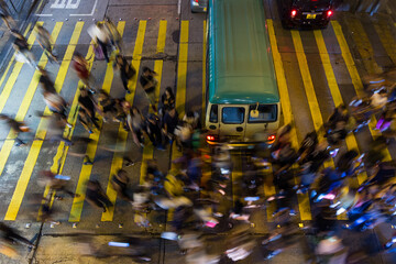 Top down view of people cross the street