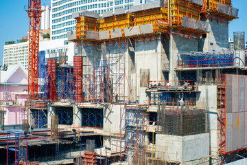 Construction site building with crane in modern city hi rise office building
