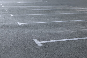 Car parking lot with white marking outdoors