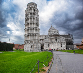White stone Cathedral and leaning tower in Italy