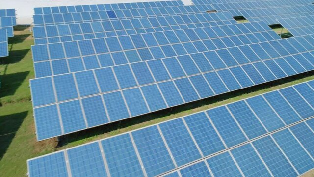 Aerial view of Solar Panels Farm solar cell. Renewable green alternative energy concept. Close-up