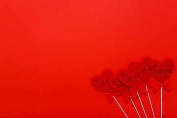 Red hearts on red background for valentines day. Holidays, love and romance