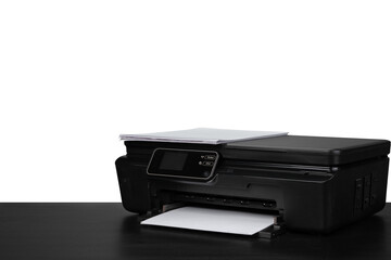Laser home printer on table against white backgorund