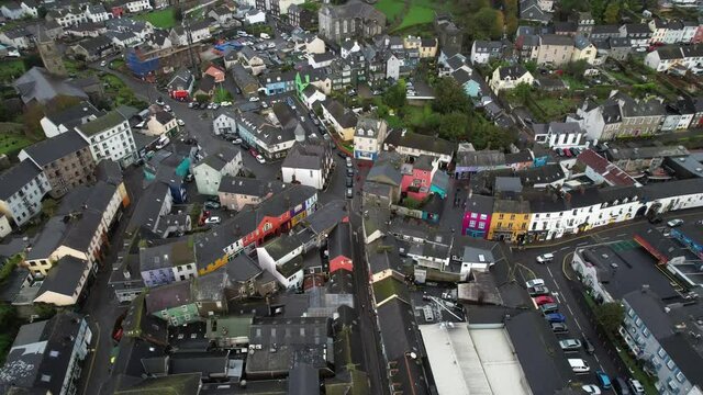 Downtown Kinsale, Ireland, Drone Aerial View, Colorful Buildings, Cars, Streets. Idyllic Irish Town on Cloudy Autumn Day