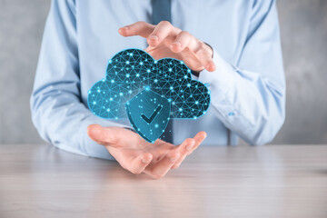 Cloud technology. Polygonal wireframe cloud storage sign with shield with a tick on dark blue....
